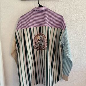 Easel Pink and Purple Striped Shirt upcycled with one of a kind logo on back.
